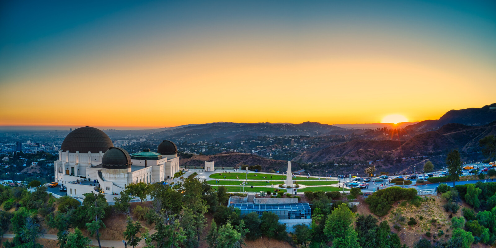 Sun behind clouds. Photo by Mourya (https://unsplash.com/photos/EwawqhV2Doc)