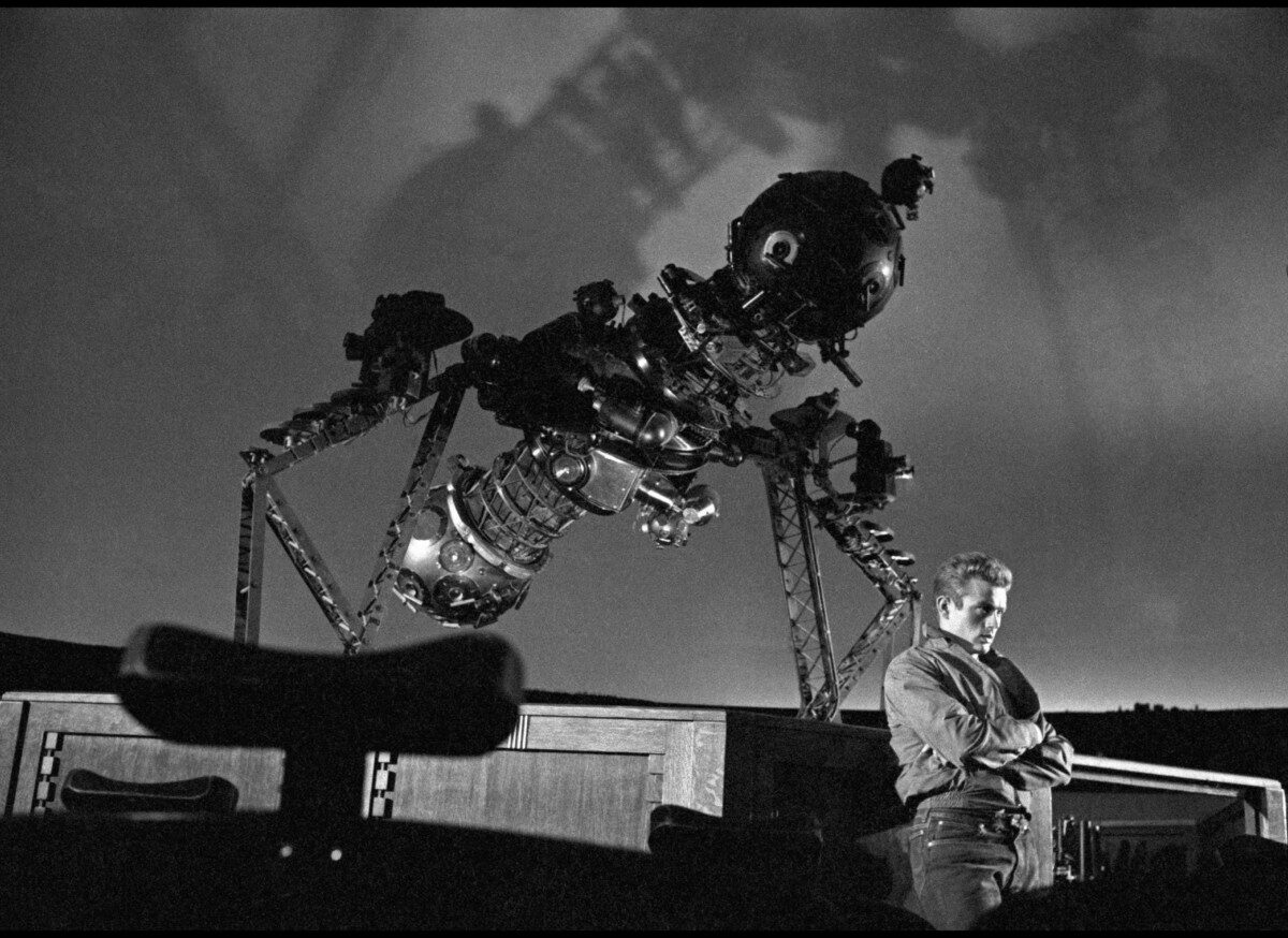 James Dean standing in front of the Zeiss projector in the planetarium.